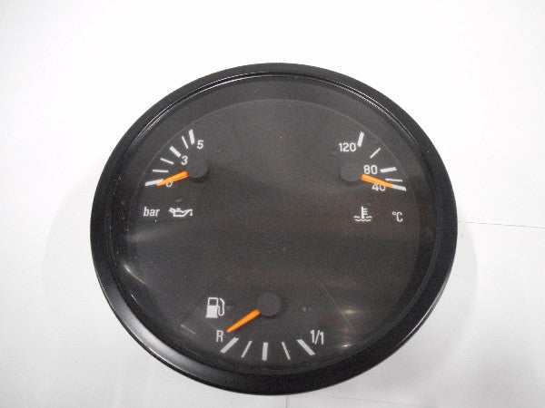 Combiklok gauge with indicators for bar pressure, temperature, and fuel level. Combiklok gauge with indicators for bar pressure, temperature, and fuel level.