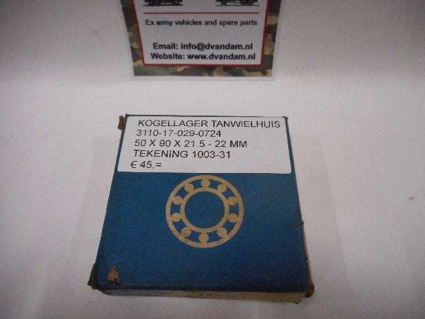 Lager tandwielkast op gele achtergrond, artikelnummer NSN: 3110-17-029-0724. Lager tandwielkast op gele achtergrond, artikelnummer NSN: 3110-17-029-0724.