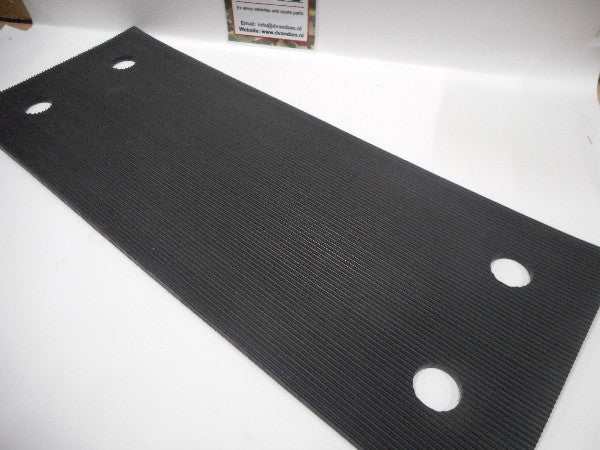 Accubak rubber mat with four circular holes. Accubak rubber mat with four circular holes.